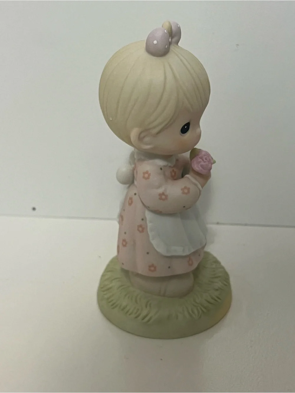 Vintage Precious Moments figurine titled “Mommy I Love You” from 1987